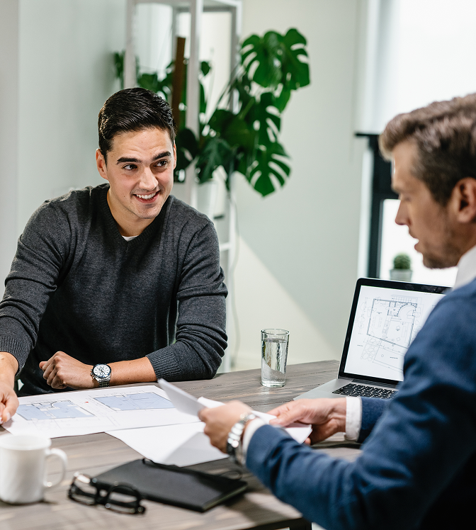 Insurance experts discussing with client